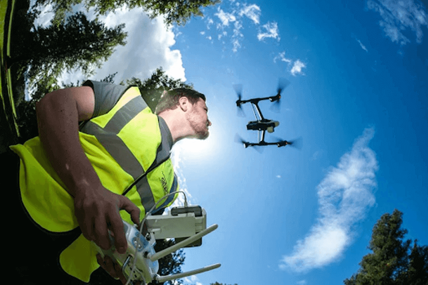 Person flying a drone in hot weather