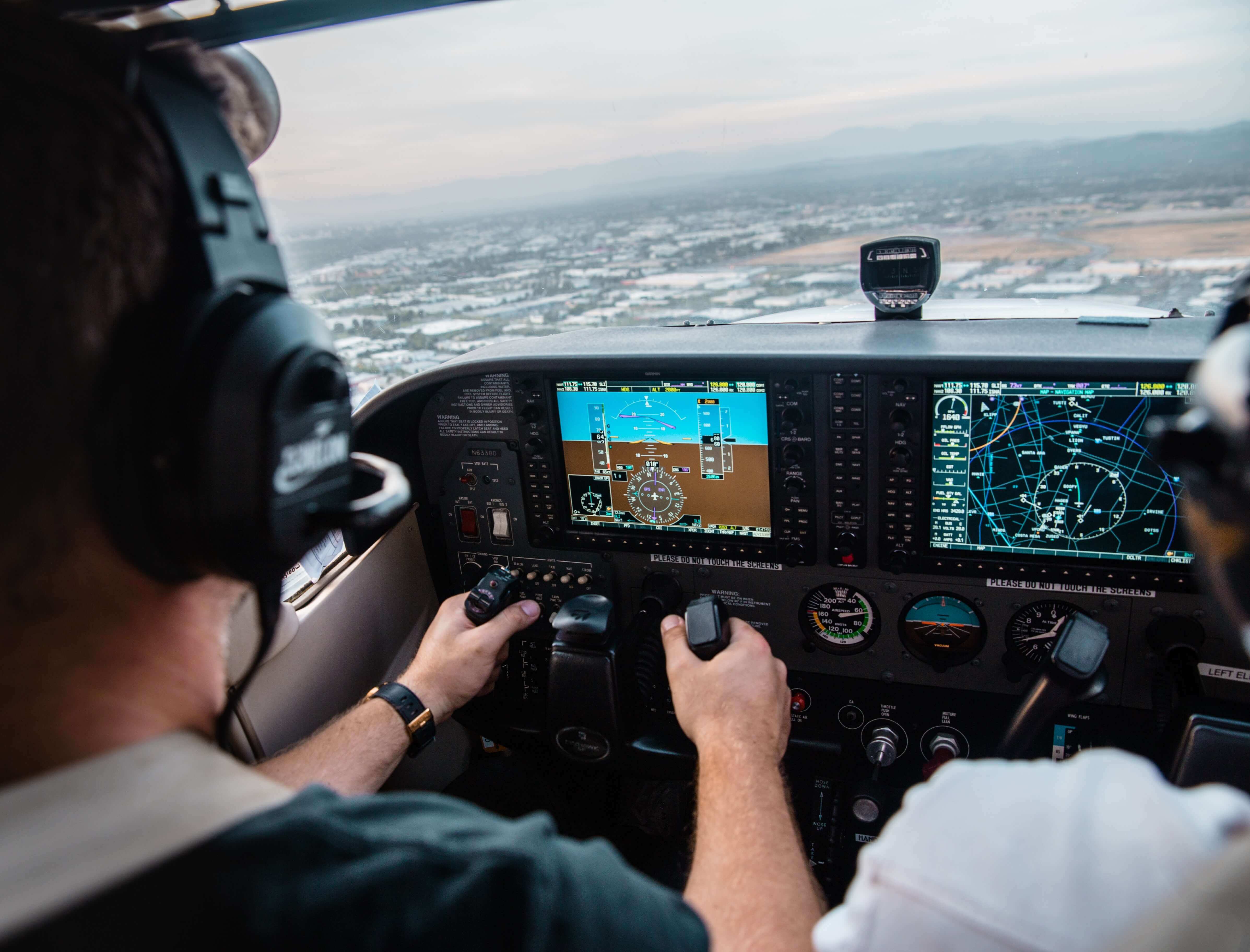 Photo of a man flying a plane